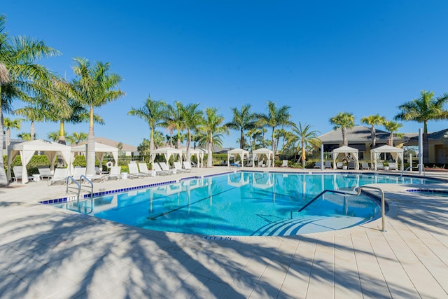 view of pool featuring a gazebo and a patio