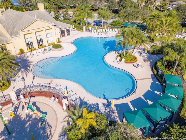 view of pool featuring a patio