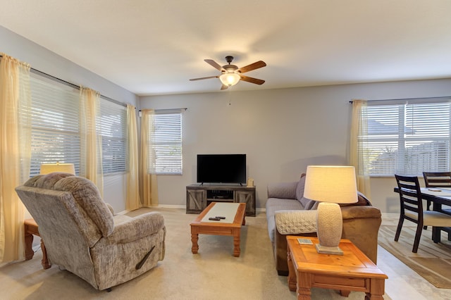 living room with ceiling fan