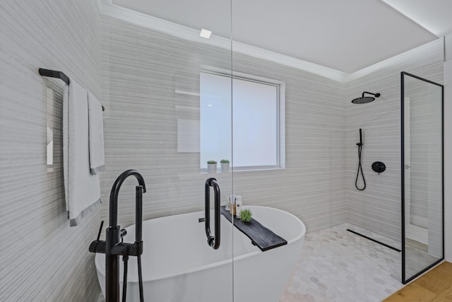 bathroom with hardwood / wood-style flooring, shower with separate bathtub, and ornamental molding