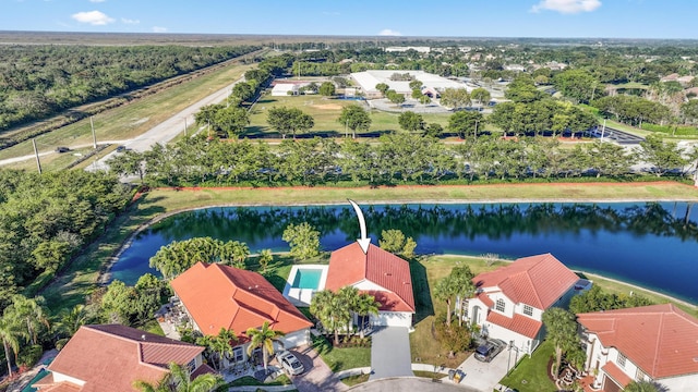 drone / aerial view with a water view