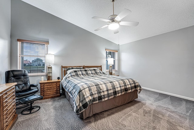 bedroom with lofted ceiling, ceiling fan, a textured ceiling, and carpet flooring