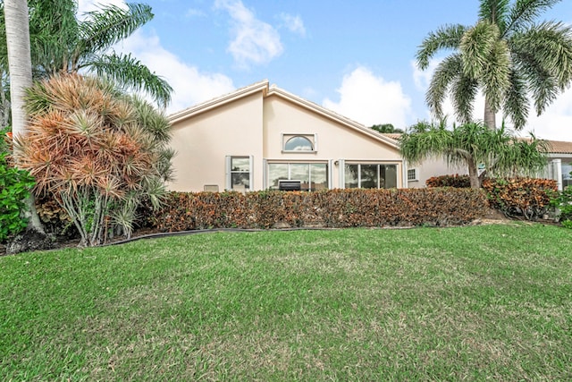 exterior space with a front lawn