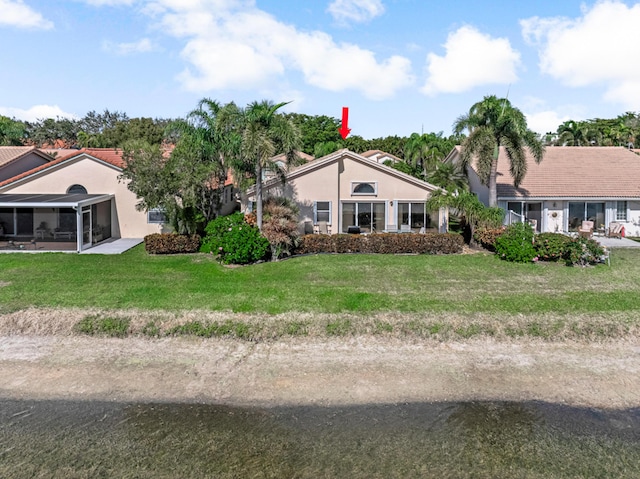 ranch-style house with a front yard