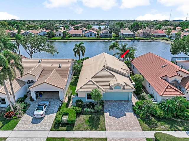 drone / aerial view with a water view