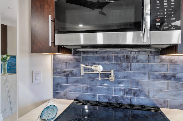 kitchen featuring tasteful backsplash