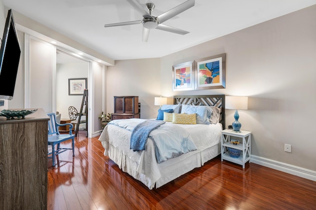 bedroom featuring hardwood / wood-style flooring and ceiling fan