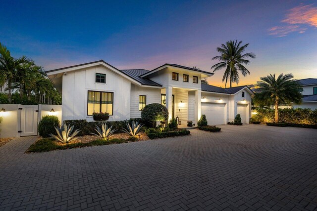 view of front of property featuring a garage