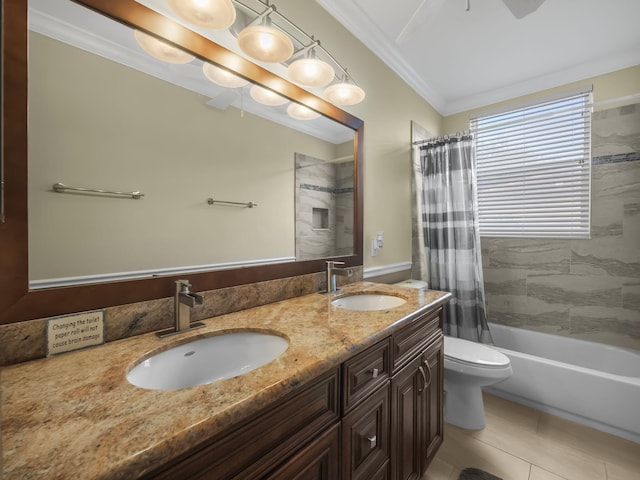 full bathroom with tile patterned floors, vanity, shower / tub combo, toilet, and ornamental molding