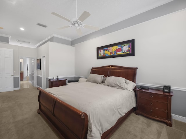 bedroom with carpet flooring, ceiling fan, and ornamental molding