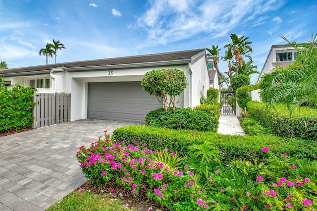 view of side of property with a garage