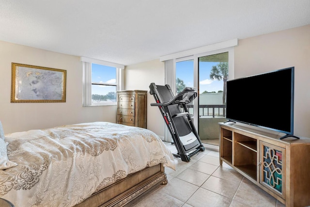 bedroom featuring light tile patterned floors