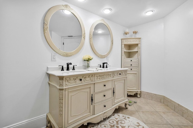 bathroom featuring vanity and tile patterned flooring