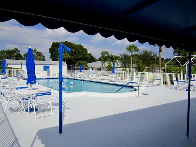 view of pool featuring a patio area