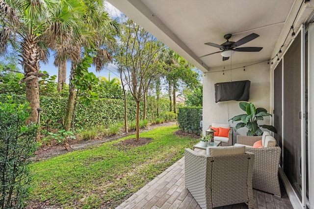 view of patio with ceiling fan