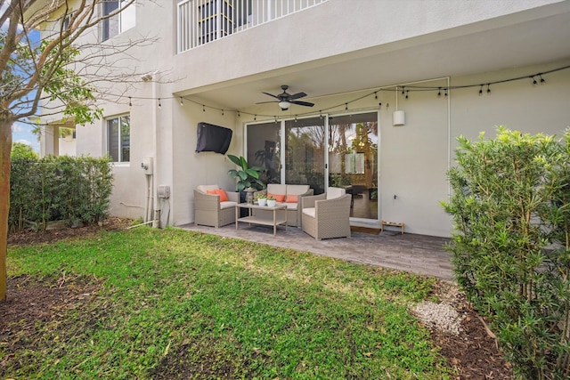 exterior space featuring ceiling fan, an outdoor hangout area, and a patio