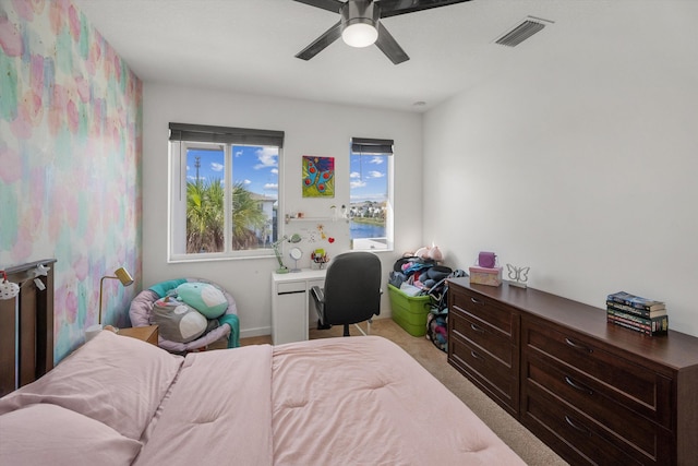 carpeted bedroom featuring ceiling fan