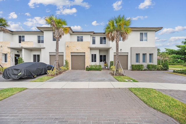 view of property featuring a garage