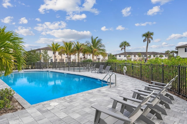 view of pool featuring a patio area