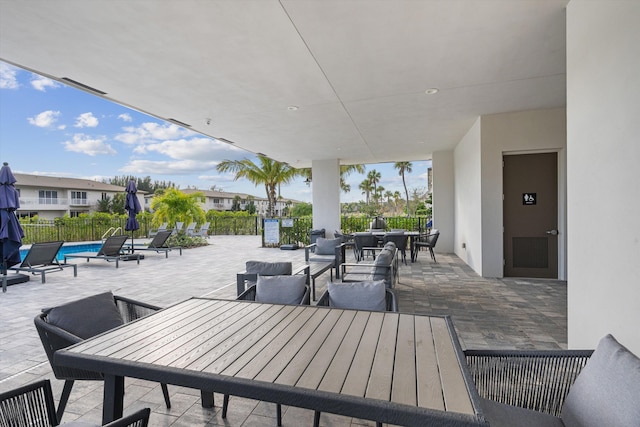 view of patio featuring a fenced in pool