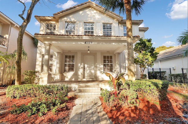 mediterranean / spanish-style house featuring covered porch