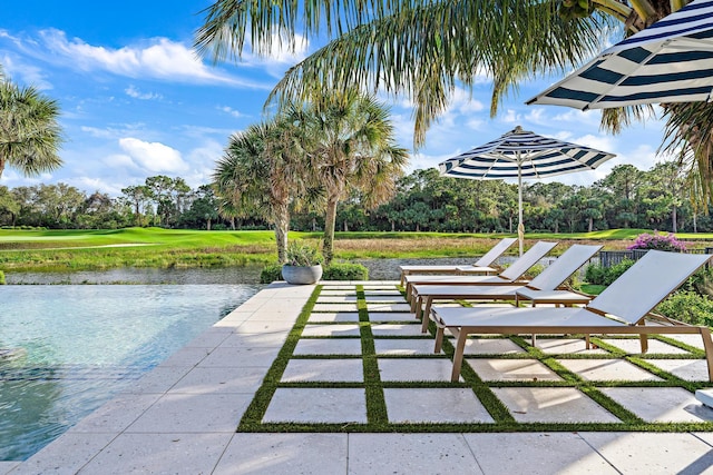 view of patio with a water view