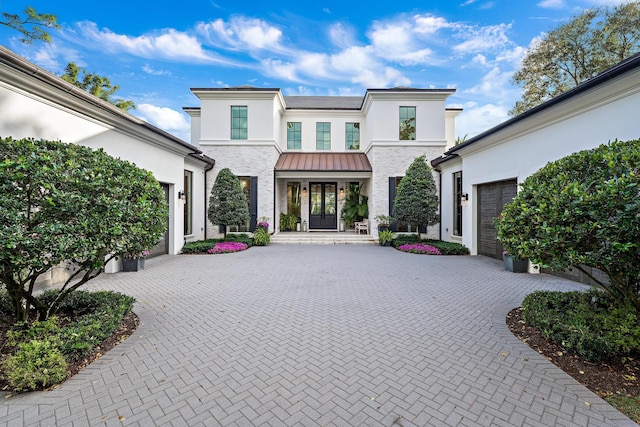 view of front of home with a garage