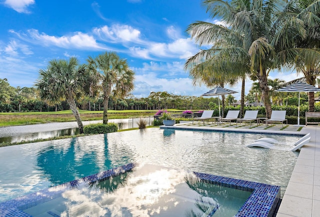 view of swimming pool featuring a patio