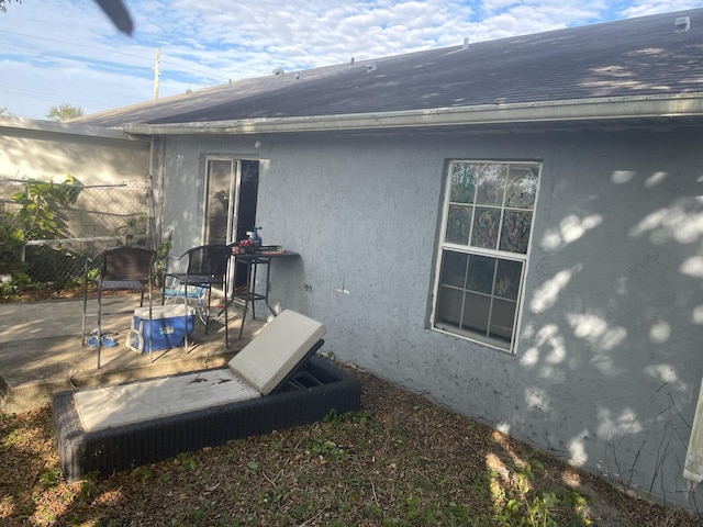 rear view of property with a patio area