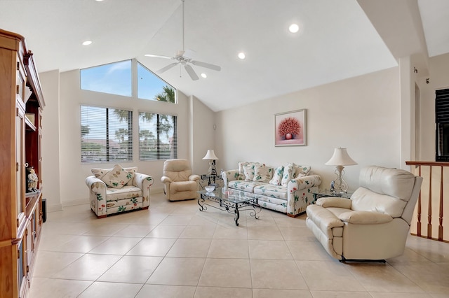 tiled living room featuring ceiling fan and high vaulted ceiling