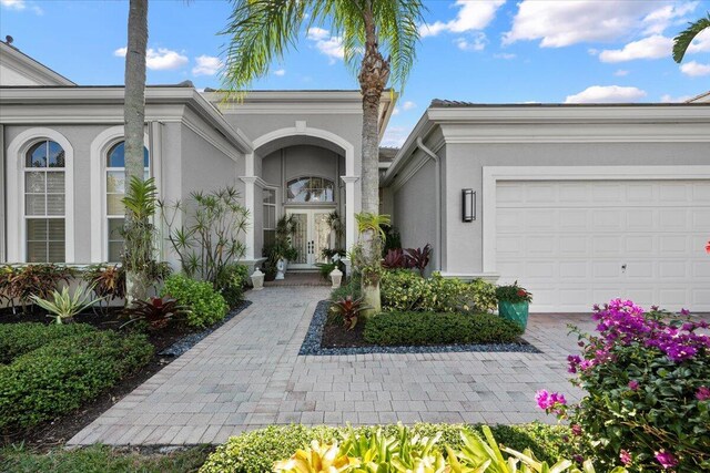 view of front of home with a garage