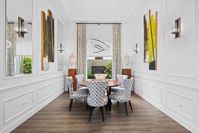 dining area featuring dark hardwood / wood-style flooring