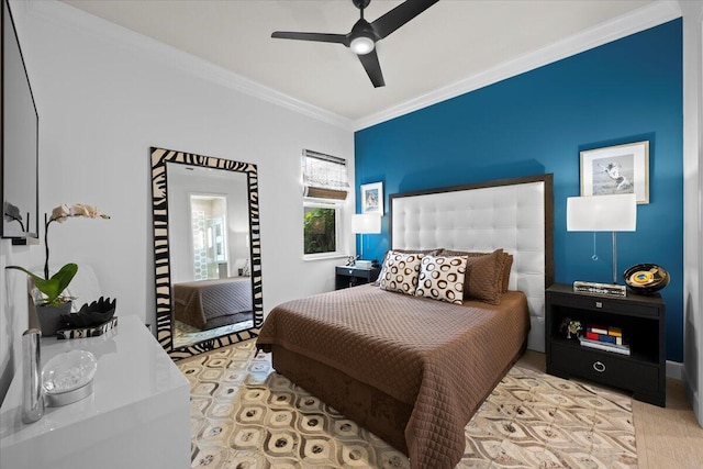 bedroom featuring crown molding and ceiling fan