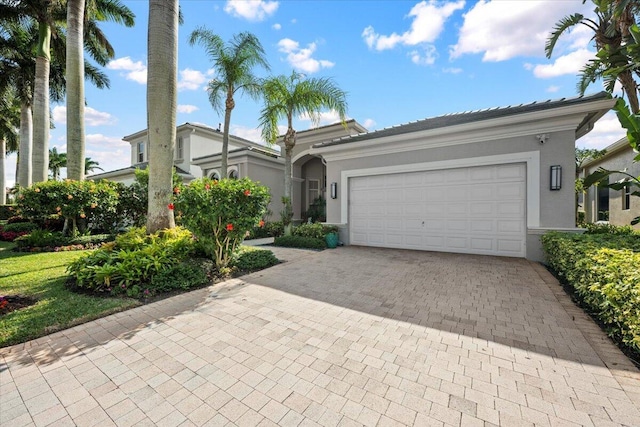 ranch-style home with a garage