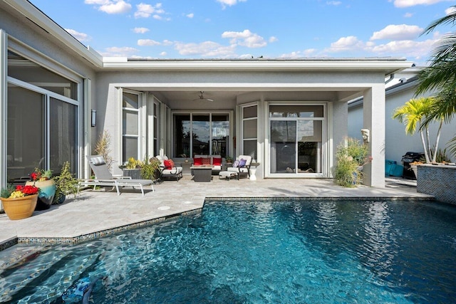 rear view of house featuring an outdoor hangout area, a patio, and ceiling fan