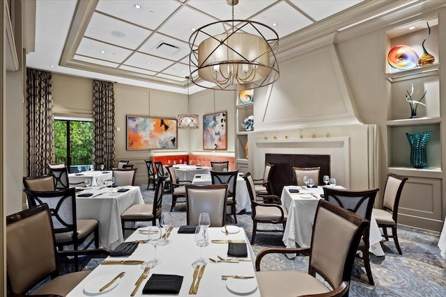 dining space featuring an inviting chandelier, coffered ceiling, and crown molding