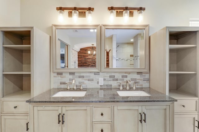 bathroom featuring backsplash and vanity