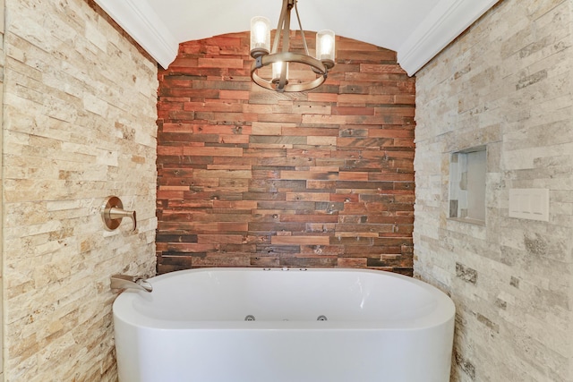 bathroom featuring lofted ceiling, crown molding, and a chandelier