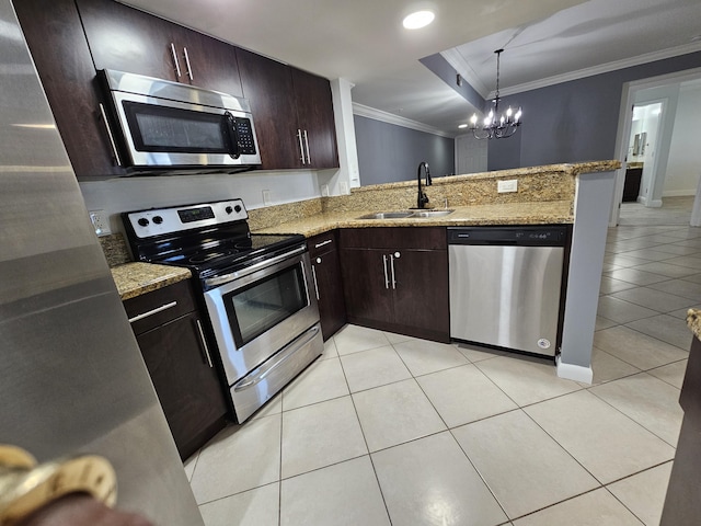 kitchen with stainless steel appliances, sink, light stone counters, ornamental molding, and a chandelier