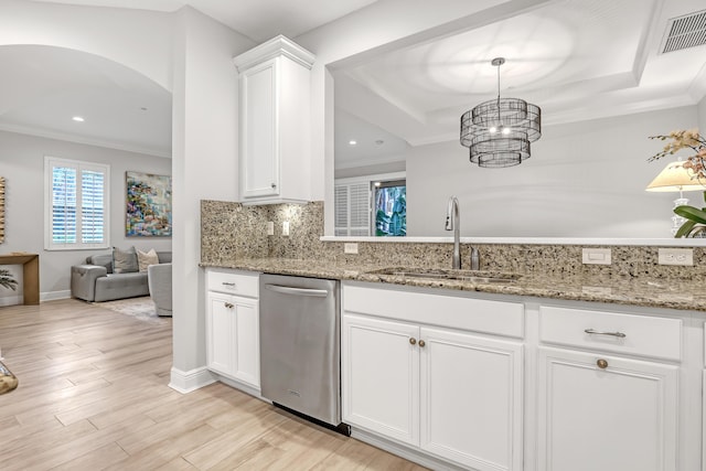 kitchen featuring sink, white cabinets, stainless steel dishwasher, light stone counters, and crown molding