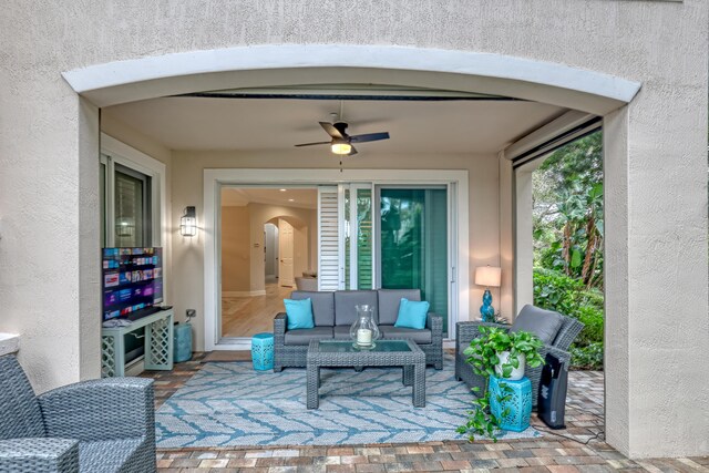 view of patio / terrace featuring an outdoor living space and ceiling fan