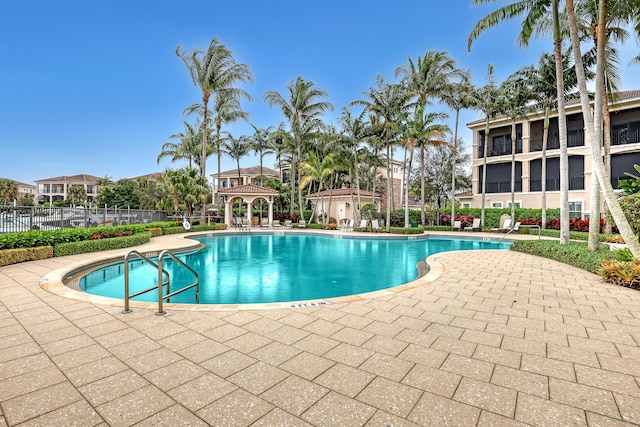 view of swimming pool featuring a gazebo and a patio