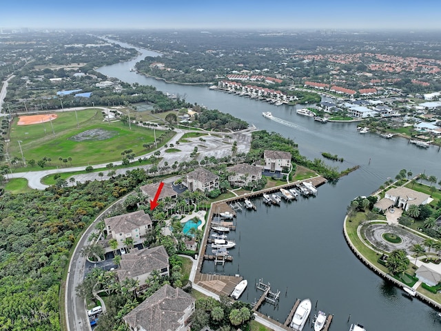 birds eye view of property featuring a water view