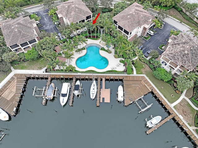 birds eye view of property featuring a water view