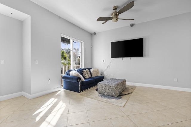 tiled living room featuring ceiling fan