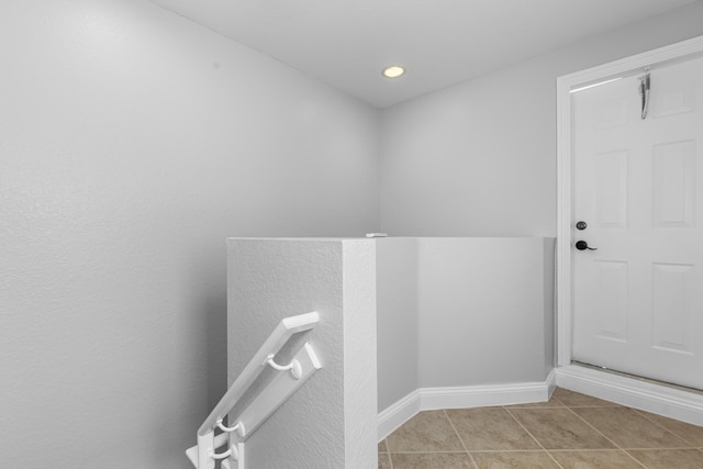 bathroom with tile patterned floors