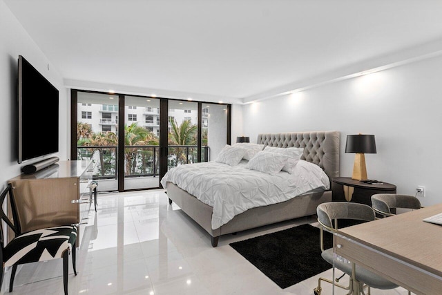 bedroom featuring access to exterior and floor to ceiling windows