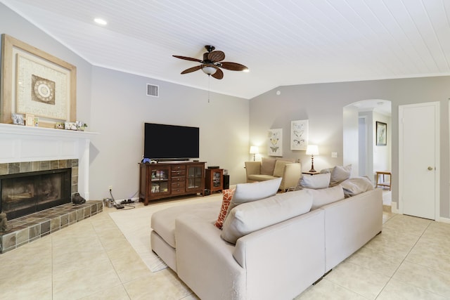 tiled living room featuring ceiling fan, lofted ceiling, a fireplace, and wooden ceiling