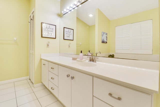 bathroom featuring tile patterned floors and vanity