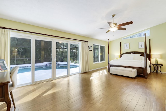 bedroom with access to outside, lofted ceiling, ceiling fan, and wood-type flooring